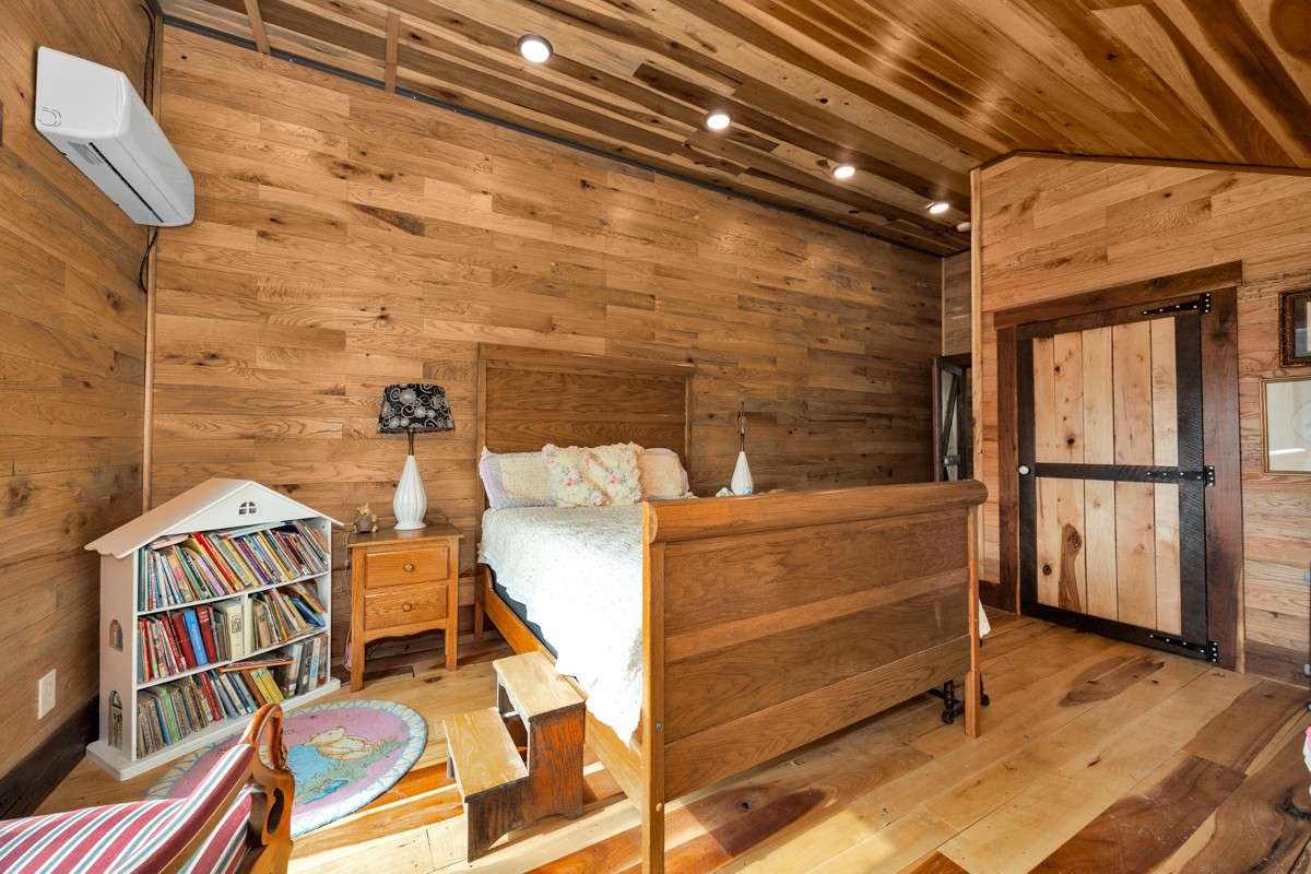 Bedroom #3 - upstairs, poplar flooring, hickory walls, recessed lighting