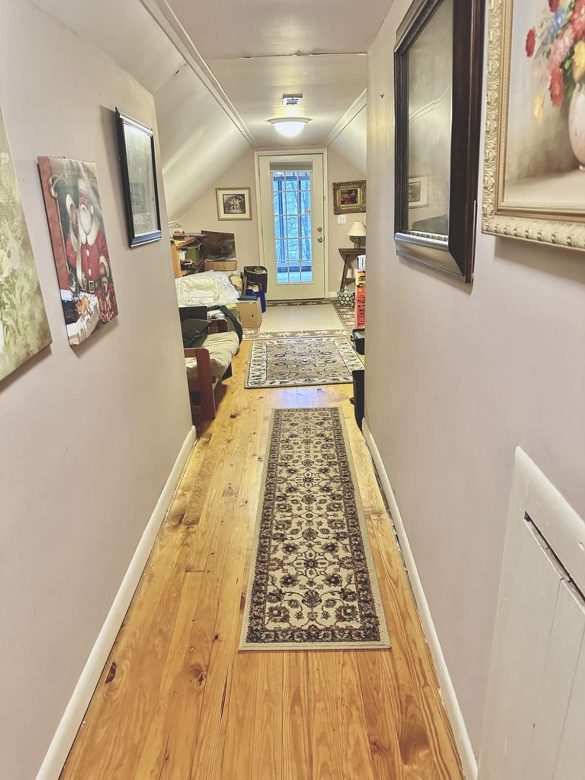Hallway leading to upstairs bedroom.