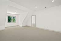 Spacious bonus rooms, ideal for entertaining or leisure time, with panoramic views of the property. Flooded with natural light from large windows, filling the room with warmth and creating an inviting atmosphere.