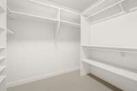Upper-level bedroom boasts a custom-crafted walk-in closet—offering a blend of luxury, privacy, and ample storage.