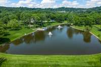 A 3-acre lake adorned with two prominent fountains, a swimming and fishing platform, and beautifully laid Tennessee limestone framing its splendor. A serene retreat where nature and craftsmanship unite.