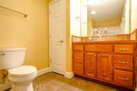Upper level with full bath  has four large connected rooms that can be used in a variety of ways. Two smaller rooms are carpeted and two larger have wood floors.