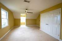 Upper level with full bath  has four large connected rooms that can be used in a variety of ways. Two smaller rooms are carpeted and two larger have wood floors.