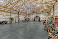 Inside photo of building that also houses a pickle ball court and a batting cage.