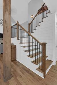 Beautiful wood staircase to second floor bedrooms, full bath, office and bonus room