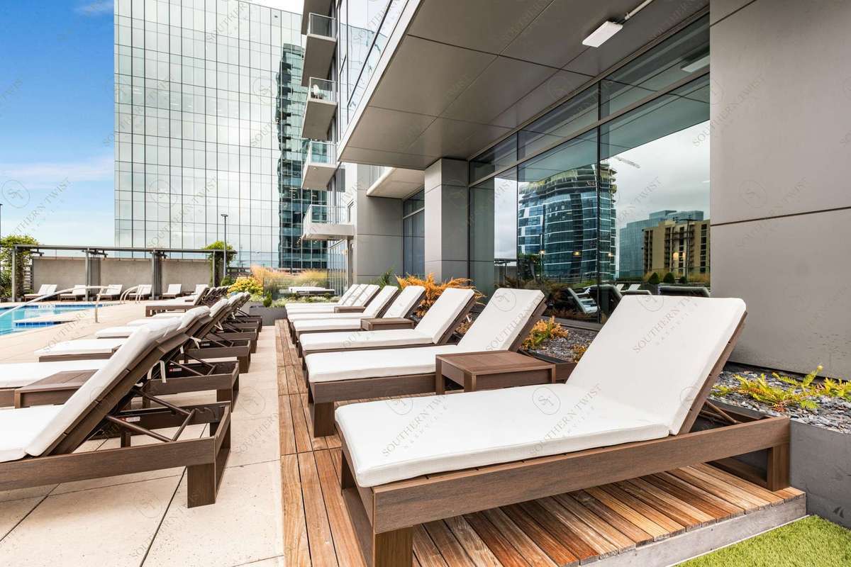 Newly installed amenity deck furnishings just in time for the new pool season