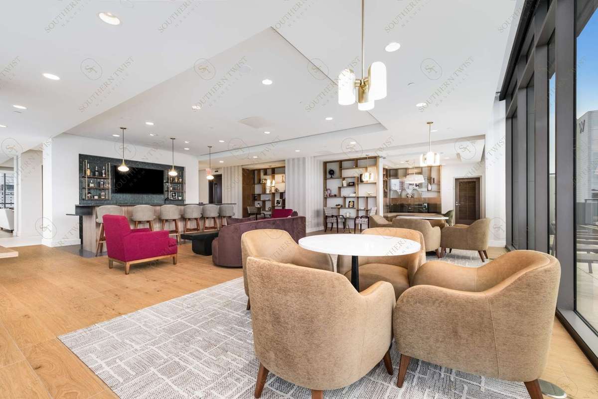 New owner's lounge bar area for gathering with family and friends before a night in the Gulch