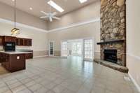 Huge Kitchen/Great Room entertaining space 27x20 with Soaring ceilings and natural skylights above.
