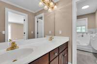 There is an Added bonus in the  owner's bathroom, a walk-in tub , but the bathroom also features a jetted tub on the other side of the double vanity area. Bedroom #1