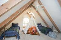 One of the third floor's loft areas