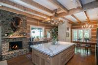 Wood burning fireplace with a gas starter, 9 ft island with quartz countertops