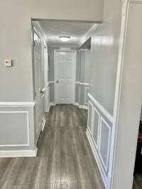 On the other side of the home is the 2 guest bedrooms, guest bathroom, and the utility room.