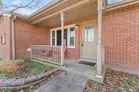 Enjoy sitting on this private front porch listening to the wildlife.