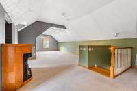 Upstairs bonus room, with gas fireplace