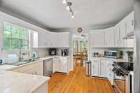 Large kitchen perfect for a large family with plenty of cabinet space.