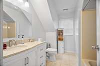 second floor bathroom with a tub/shower combo.