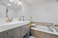 Large owner's bath complete with dual sinks and jacuzzi style tub.