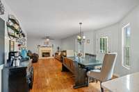 Large open space from the kitchen to the living room with the breakfast nook in between.
