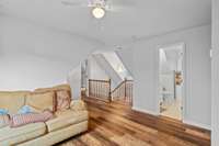 Another view of the second floor living area and entrance to the bathroom.