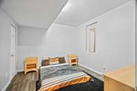 Lower level room with storage.
