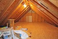 Decked attic area for storage.