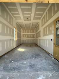 In addition to the main garage area, there's a separate bay.