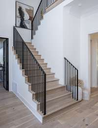 Front Staircase  *Model home photo shown for example purposes only; actual home features similar selections.*