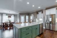 Enjoy the openness of the common areas. The kitchen flows freely into the dining area and living areas, creating an abundance of space for entertaining.