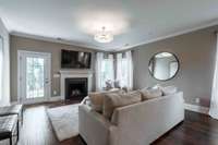 Living area with new gas log inserts. Perfect for those cold winter nights.