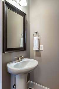 Half-bath on main level is perfect for entertaining.