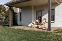 Covered patio on the back is perfect to sit and enjoy outside activities.