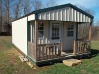 she-shed/office  has electricity!   this photo taken prior to the leanto being added.