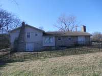 back of house showing fence and patio