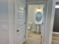 1/2 bath at foyer *STOCK PHOTO*