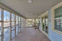 Awesome Screened Front Porch Overlooking Patio and Lake