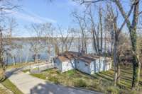 Sweet Lake Cottage Tucked in at the Bottom of Property