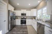 MODEL HOME PICTURED WITH SIMILAR FINISHES