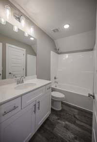 MODEL HOME PICTURED WITH SIMILAR FINISHES