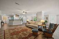 This area is so expansive & can accommodate numerous furniture options.