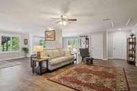 This 40x32 space on the lower level offers so many options for entertaining or just year round living. The door on the far right allows access to the "SAFE ROOM" if ever needed in inclement weather.