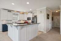 Recessed lighting & the new backsplash are just a few of the upgrades in this beautiful kitchen!