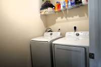 This separate laundry room is a blank canvas, ready to be transformed into your dream laundry space. With plenty of room for storage, folding, and organization, you can design the perfect setup to suit your needs.