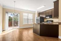 The kitchen has plenty of cabinet and counter space