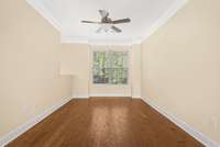 This is the Living Room space that is also pictured virtually staged to help you visualize how this space could be decorated