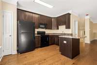 From the front entry, you will walk up the stairs into this amazing open floorplan