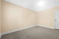 View of Bonus Room from Garage Entry at bottom level of home