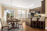Plenty of space for seating for 8 in this kitchen! Kitchen is virtually staged