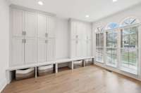 Drop-Zone off of Front Entry with Custom Cabinetry & French Doors