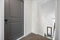 Upstairs - the closed door leads to attic area - walk in storage is a plus for me!