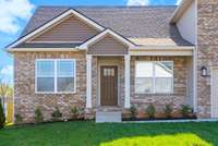 Bring a rocking chair and enjoy this front porch!